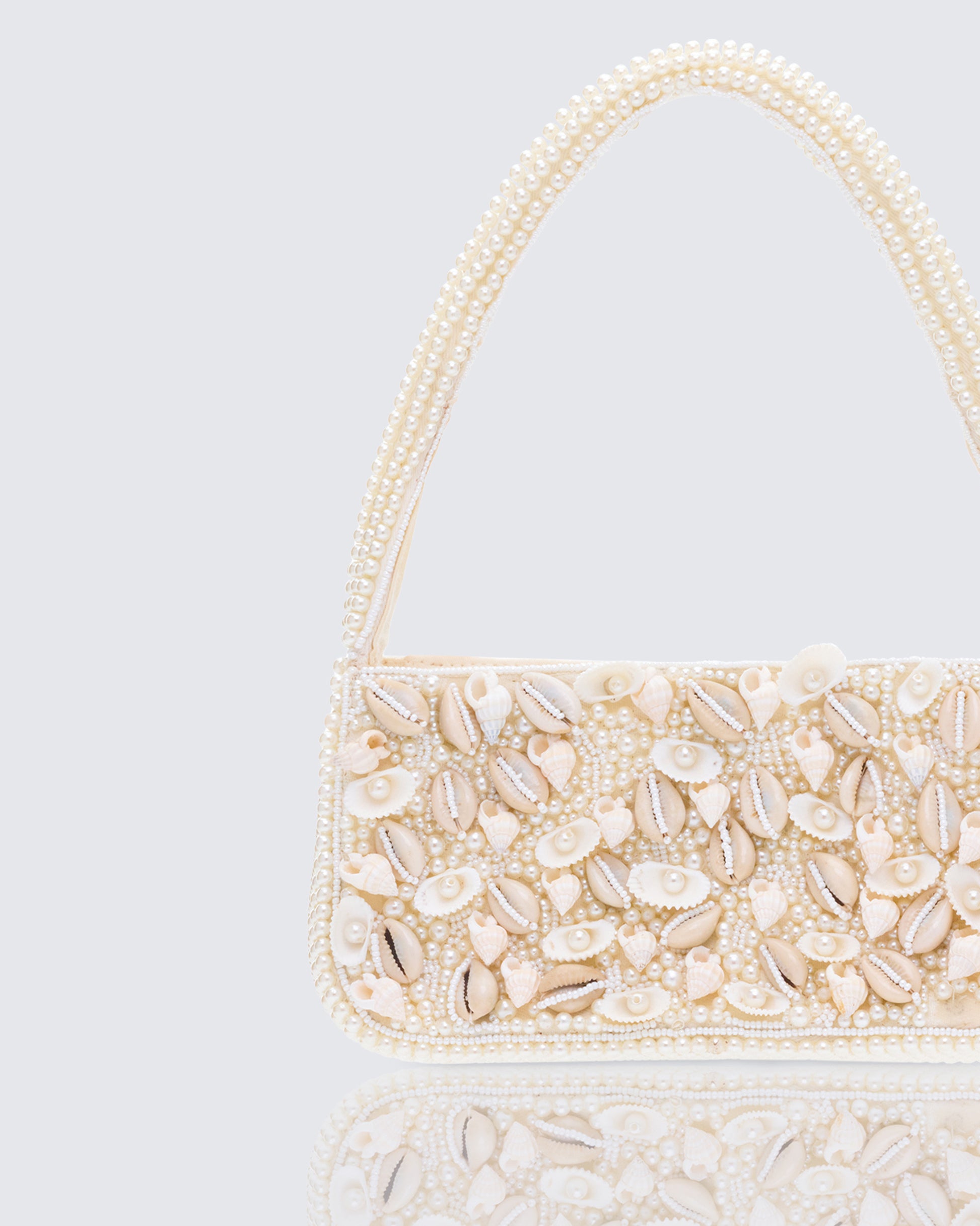 Sadaf Ivory Cowrie Shell Handbag - close up detail