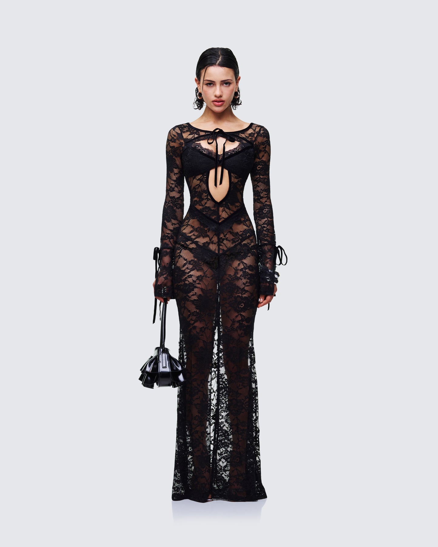 Women's black maxi dress styled on model – FINESSE