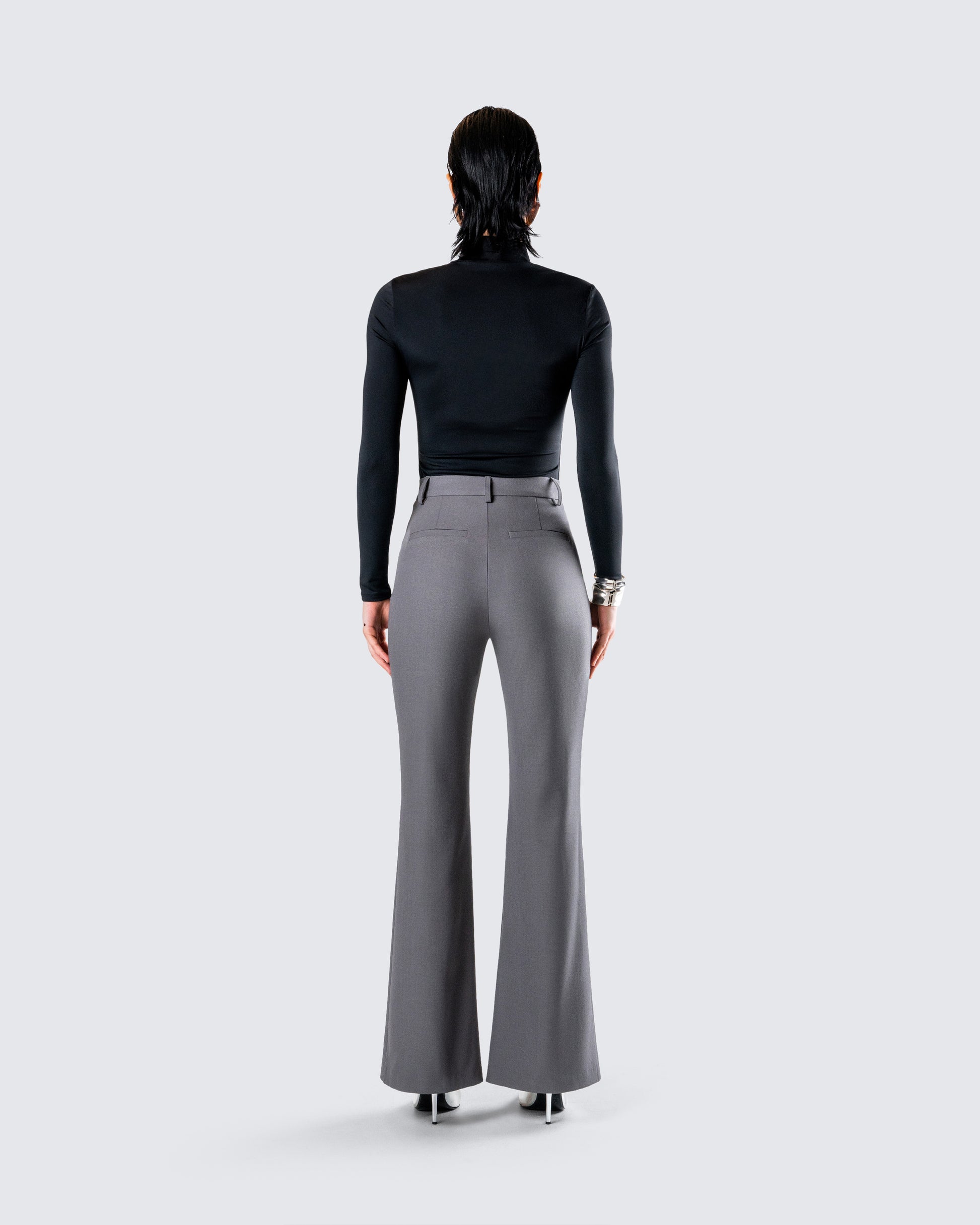 grey dress pants with black turtle neck Work capsule- Black turtleneck and grey pants. It's a timeless color combo for a reason! #themutedstyleco #