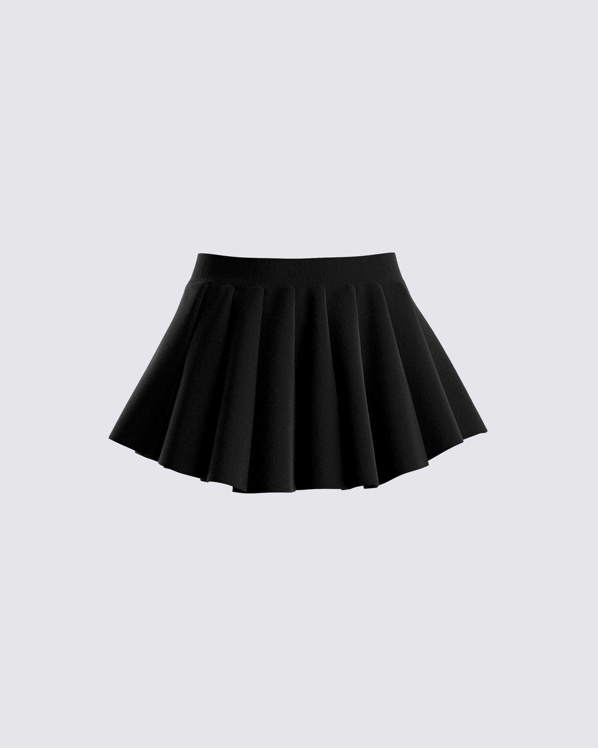 Short black pleated skirt